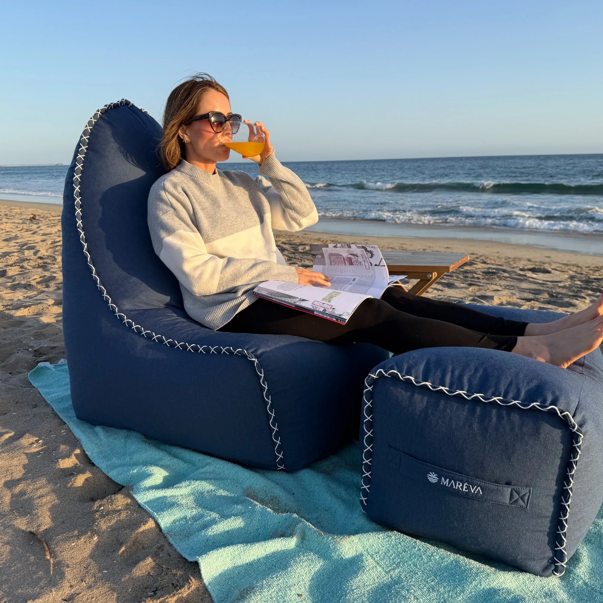 MARÉVA Lounger and Footrest set in Midnight Tide navy, lifestyle photo