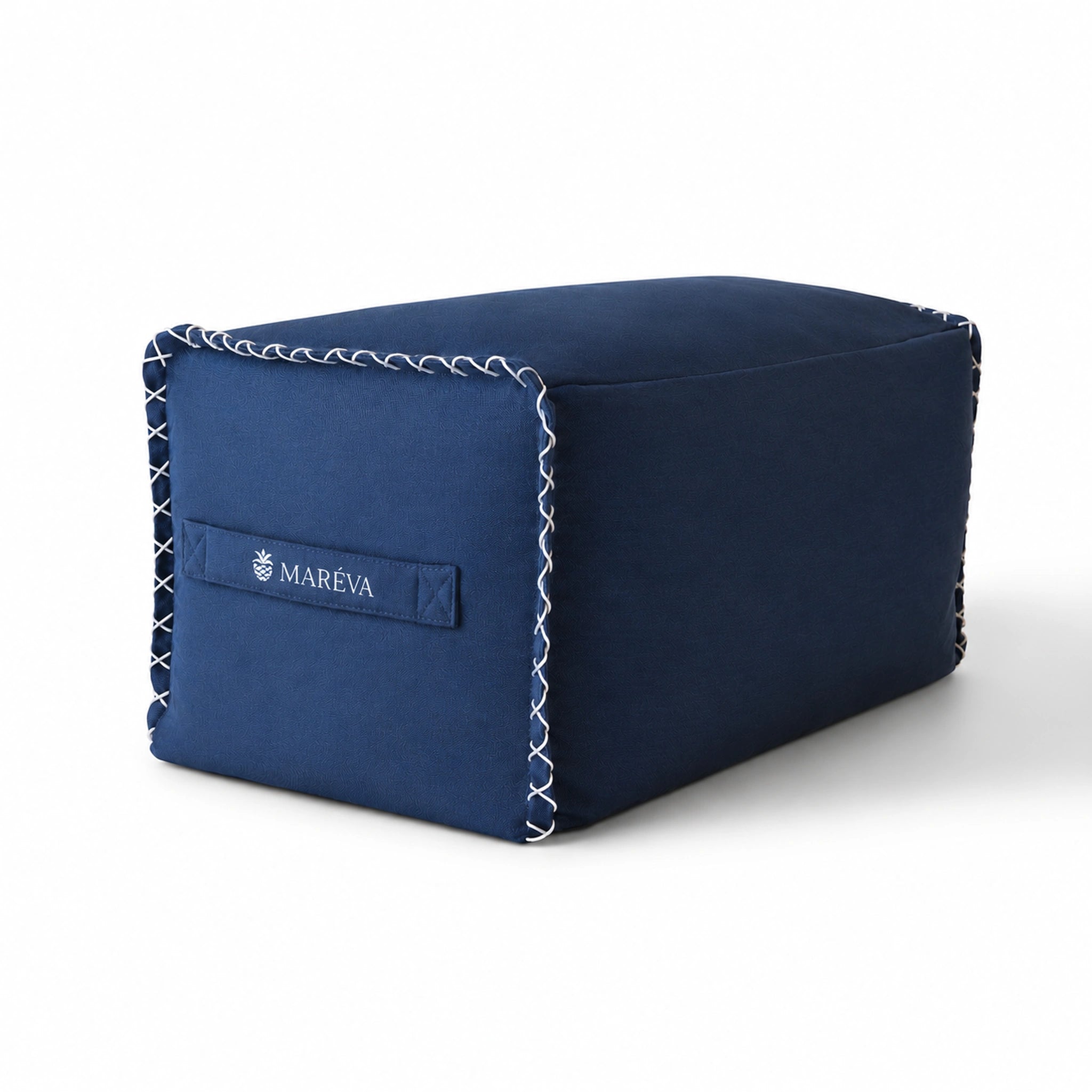 MARÉVA footrest shown in Midnight Tide with white signature x-stitching on a white background