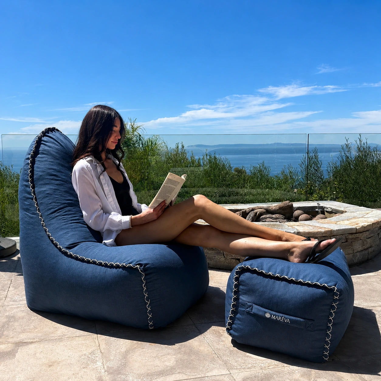 MARÉVA Lounger and Footrest set in Midnight Tide navy, lifestyle photo