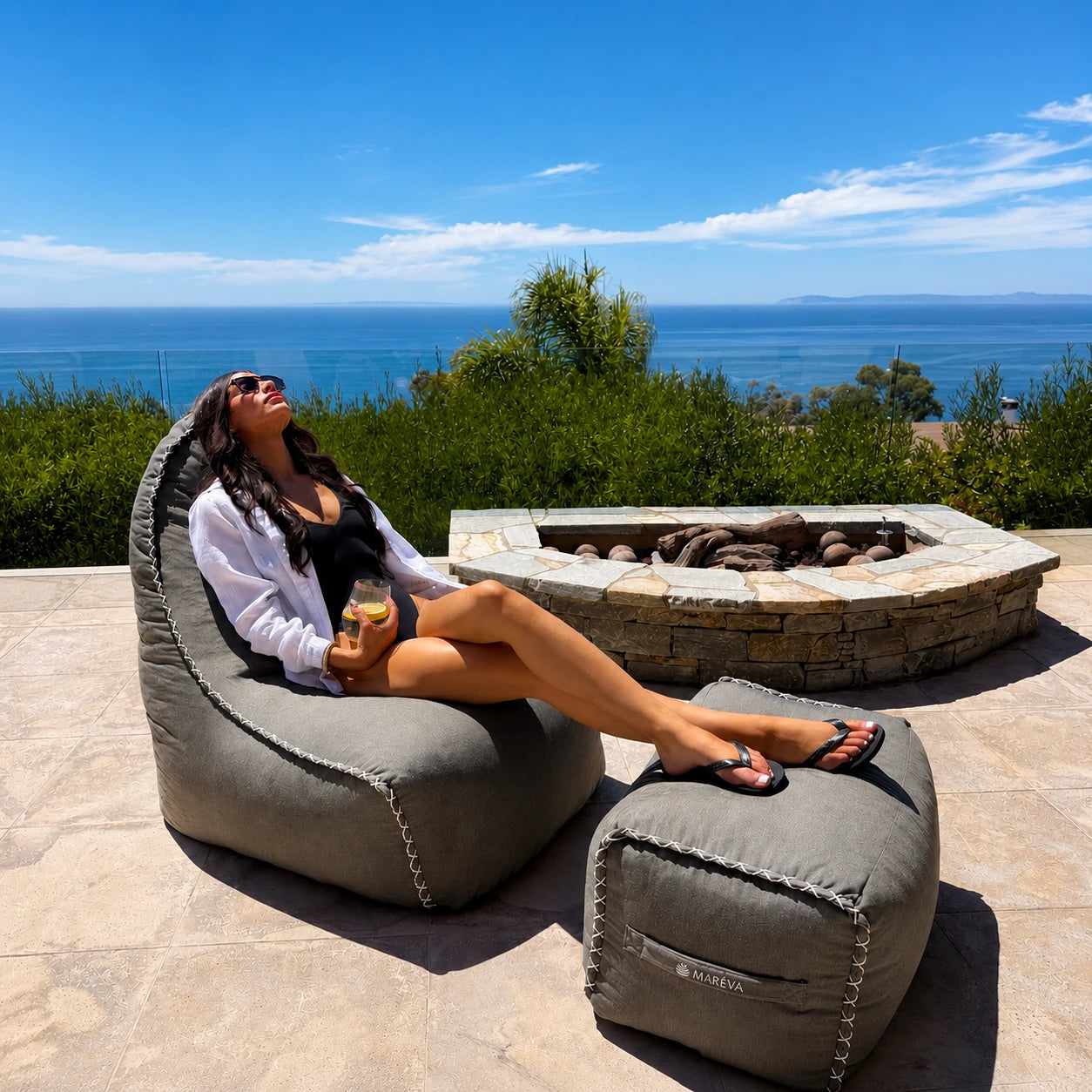 MARÉVA Lounger and Footrest set in Harbor Fog gray, lifestyle photo