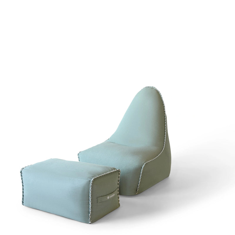 MARÉVA Lounger and Footrest set in Coastal Sage seafoam green, studio photo